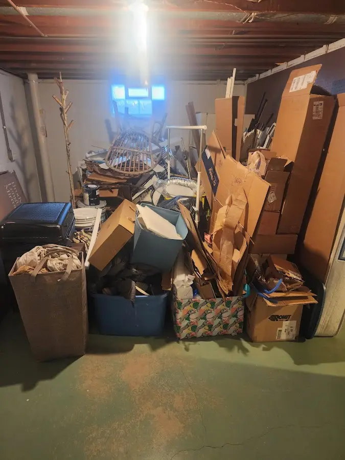 Roll-off dumpster container at job site for 2 Yard Dumpster Rental in Williamsburg